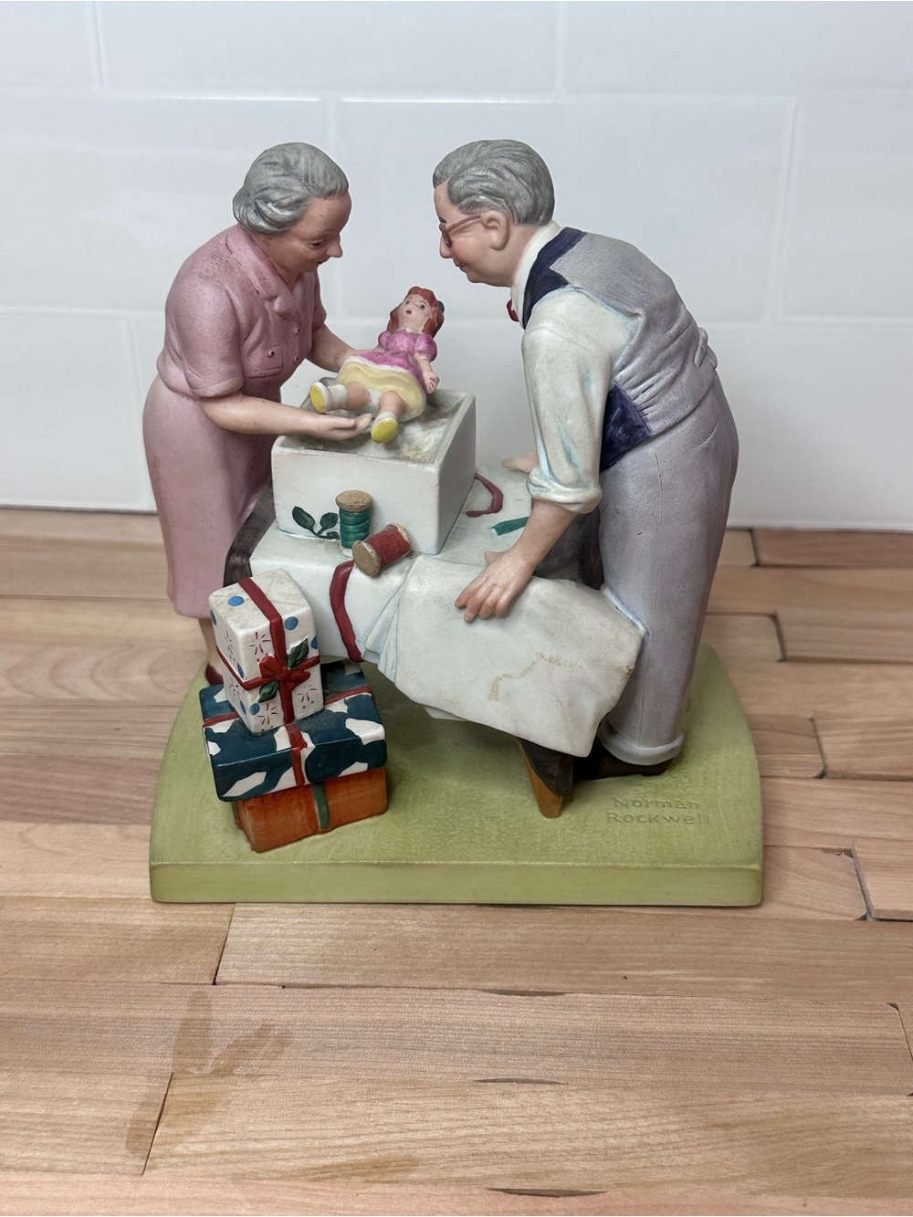 Norman Rockwell “Wrapping Christmas Presents”